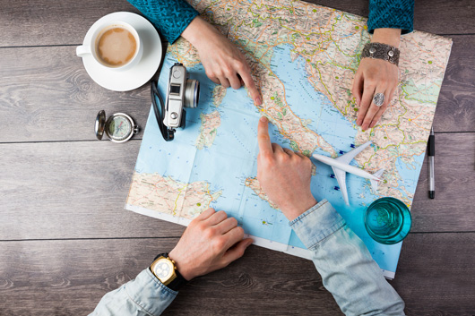 couple-planning-honeymoon-000074712815_Medium.jpg